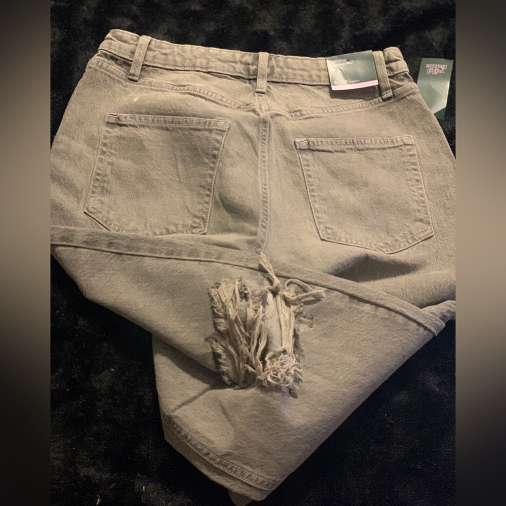 Gray washed blue jeans